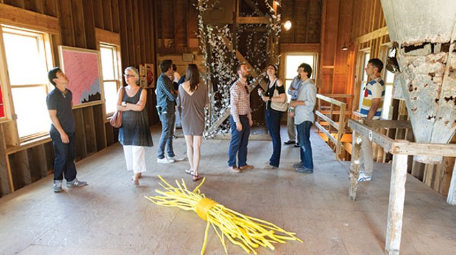 From the Wassaic Project 2013 summer exhibition “Homeward Found” preview party held on June 15. In the foreground, Tora Lopez's Two Cheers For The Bundle Of Sticks Metaphor. In the background, the ivy wrapped around the wooden structure is Gi
