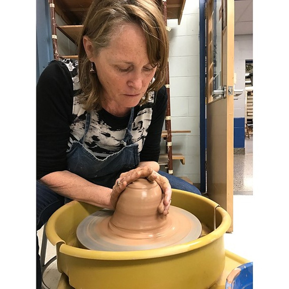 31543d38_jacqui_doyle_schneider_at_pottery_wheel-photo_by_el.jpg