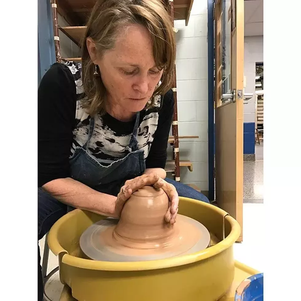 31543d38_jacqui_doyle_schneider_at_pottery_wheel-photo_by_el.webp