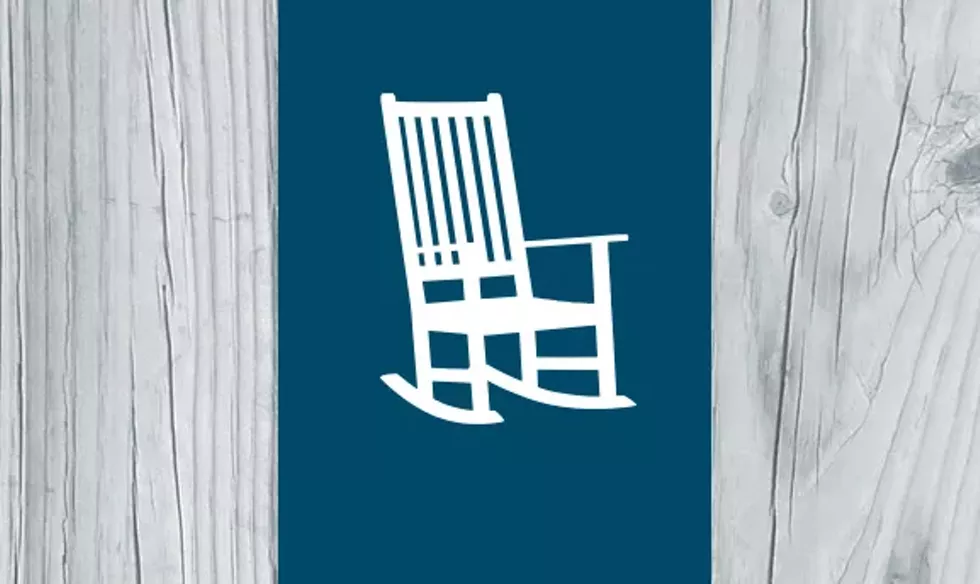 chair-on-blue-and-wood.webp