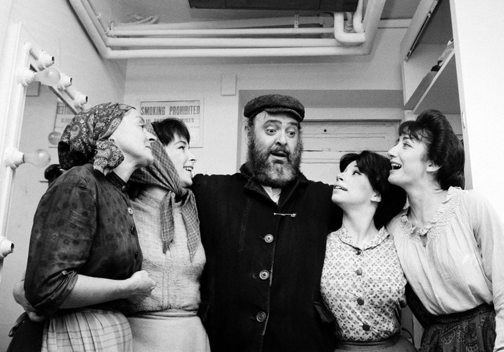 Zero Mostel, poses backstage with cast members after the play's opening performance at the Imperial Theatre on Sept. 22, 1964