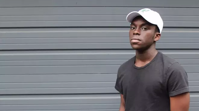 Image: Spoken Word Performance by Kofi Dadzie, Youth Poetry Slam and Open Mic