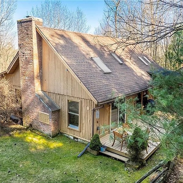A Log-Sided Cabin in Red Hook: $895K