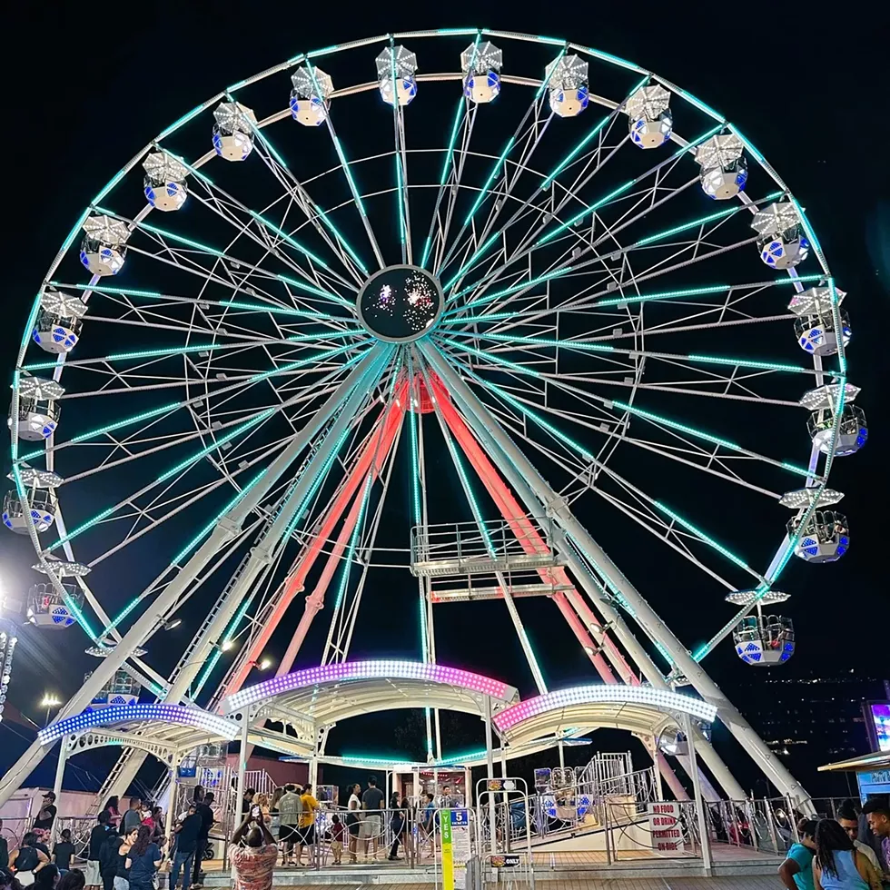 The fair's midway features rides for the whole family including the 110-foot tall "The Wheel."