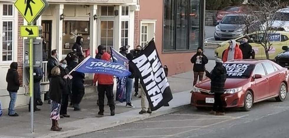 Far-right demonstrators outside Caffe a la Mode on January 10. One of the cafe&#146;s owners participated in the January 6 riot at the Capitol,