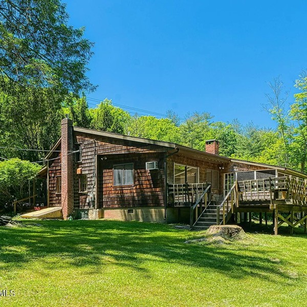 An Expanded Log Cabin in Stone Ridge: $549K