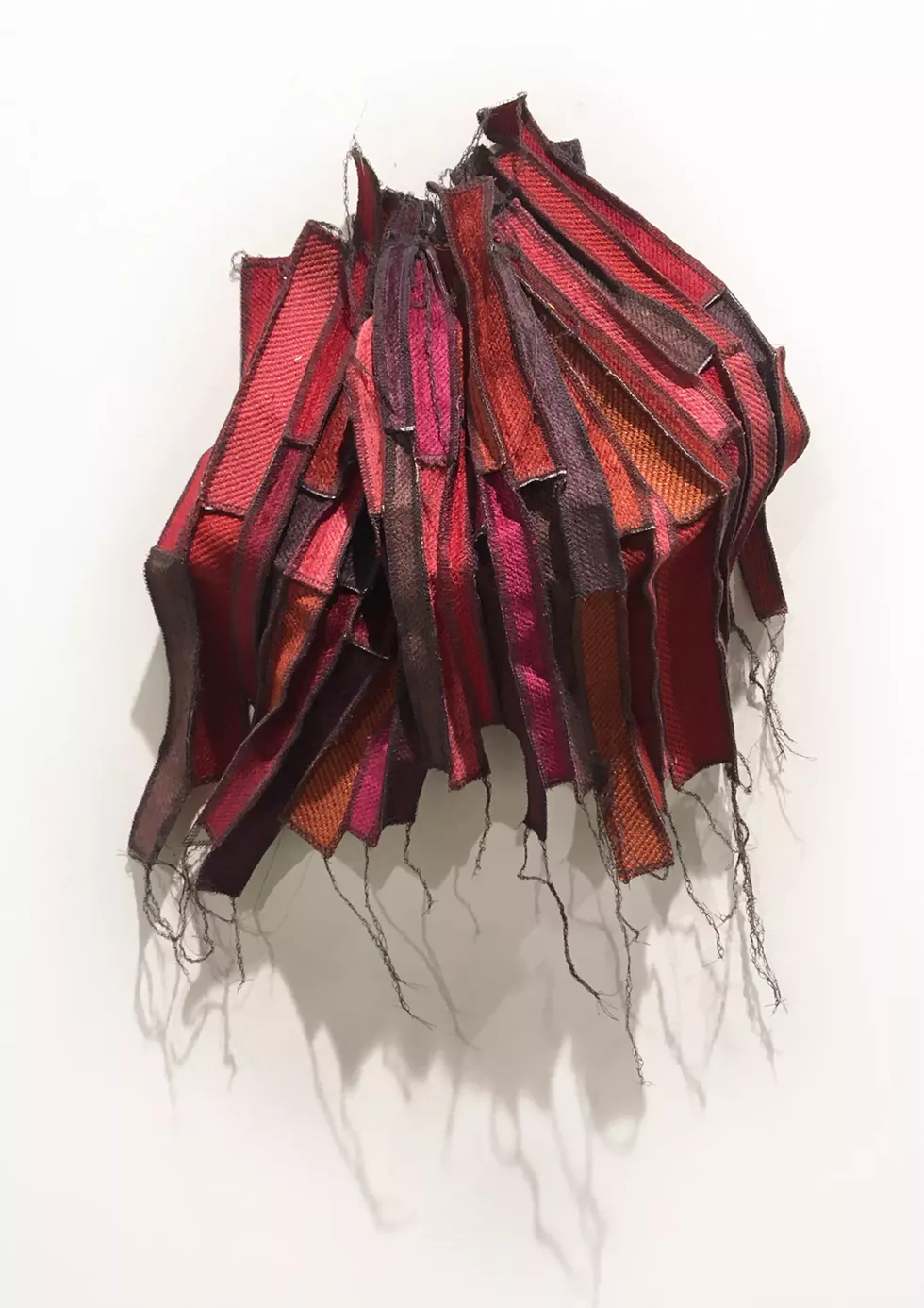 Holly McCabe, Planum Tortuosum Calidum, 2020. Burlap fabric samples over lock thread. 15 x 15 x 5 inches.
