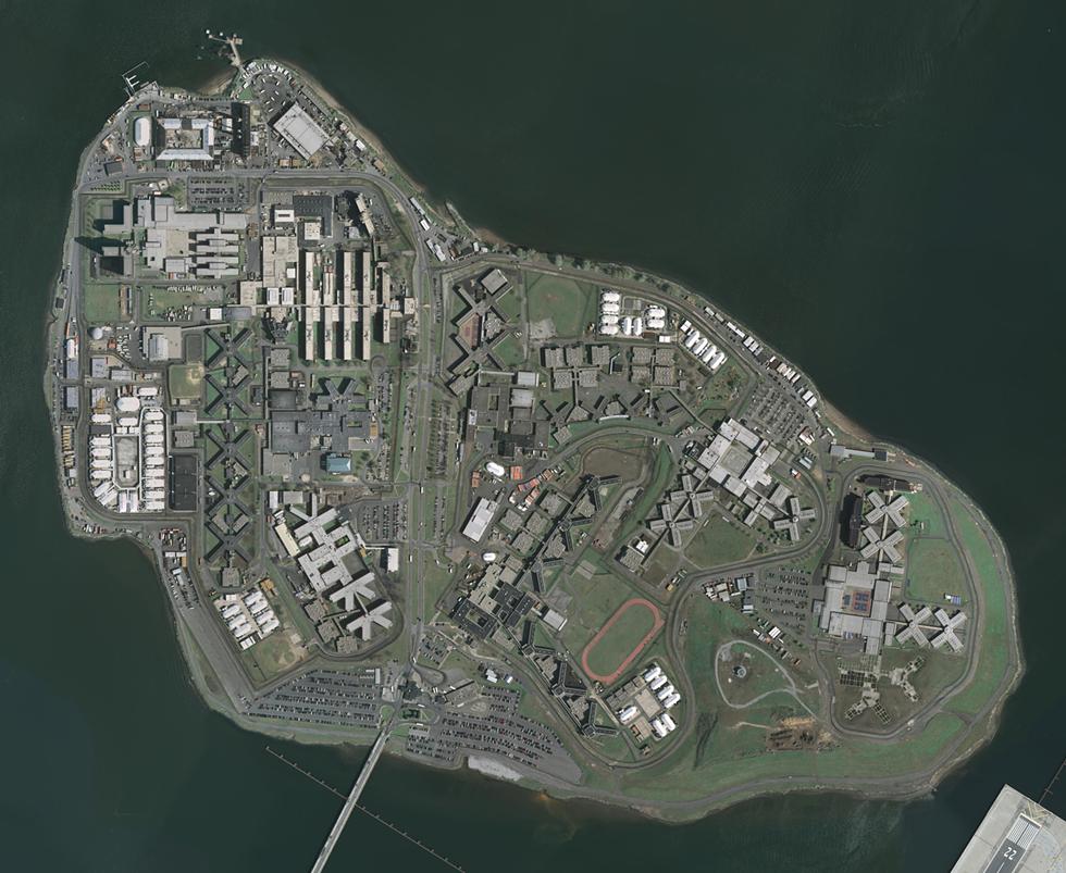Prisons like Rikers Island, above, have become epicenters of COVID-19.