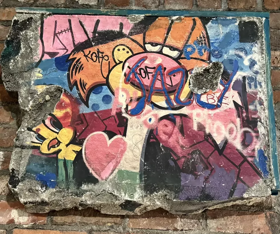 An "Urban Wall" art piece by Franc Palaia showing at Curio Cabinet of the Hudson Valley
