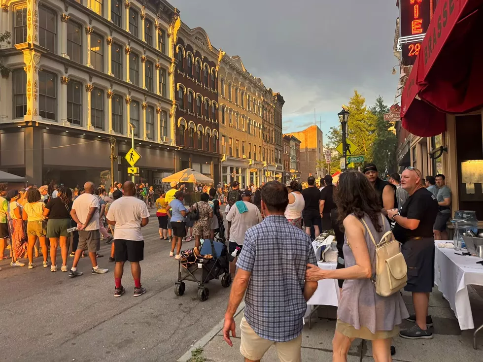 Guests gather around to enjoy fire spinners and fresh oysters at the previous July 3 First Friday event