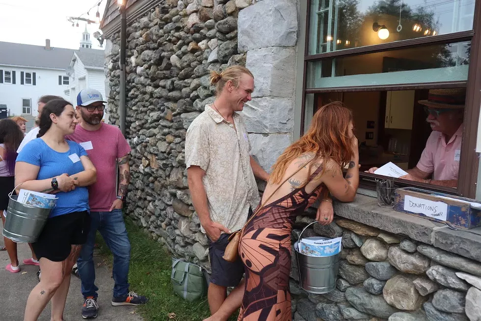 Community Members line up for ice cream at the 2022 Dewey Memorial Hall Ice Cream Social