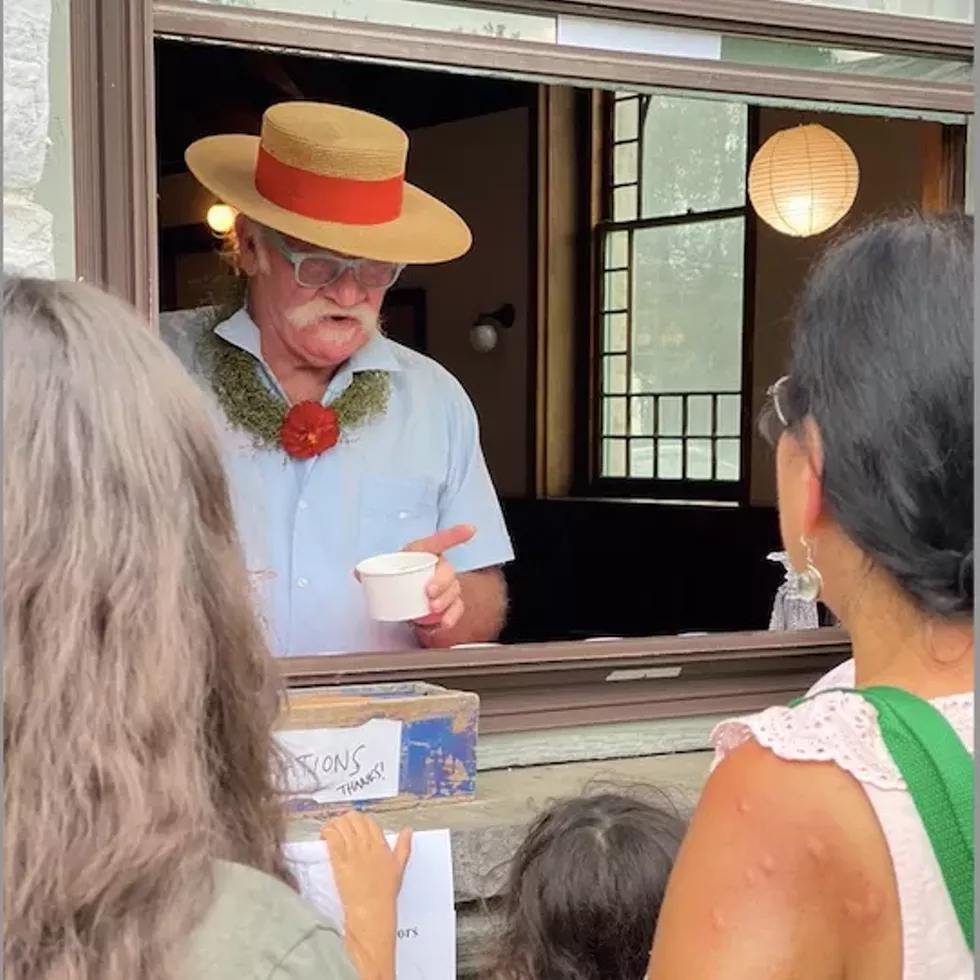 Attendees getting served at Dewey Hall's 2023 Ice Cream Social
