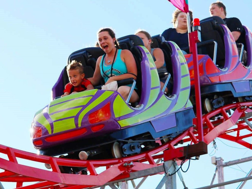 The carnival midway features rides for all ages from kiddie rides to thrill rides.