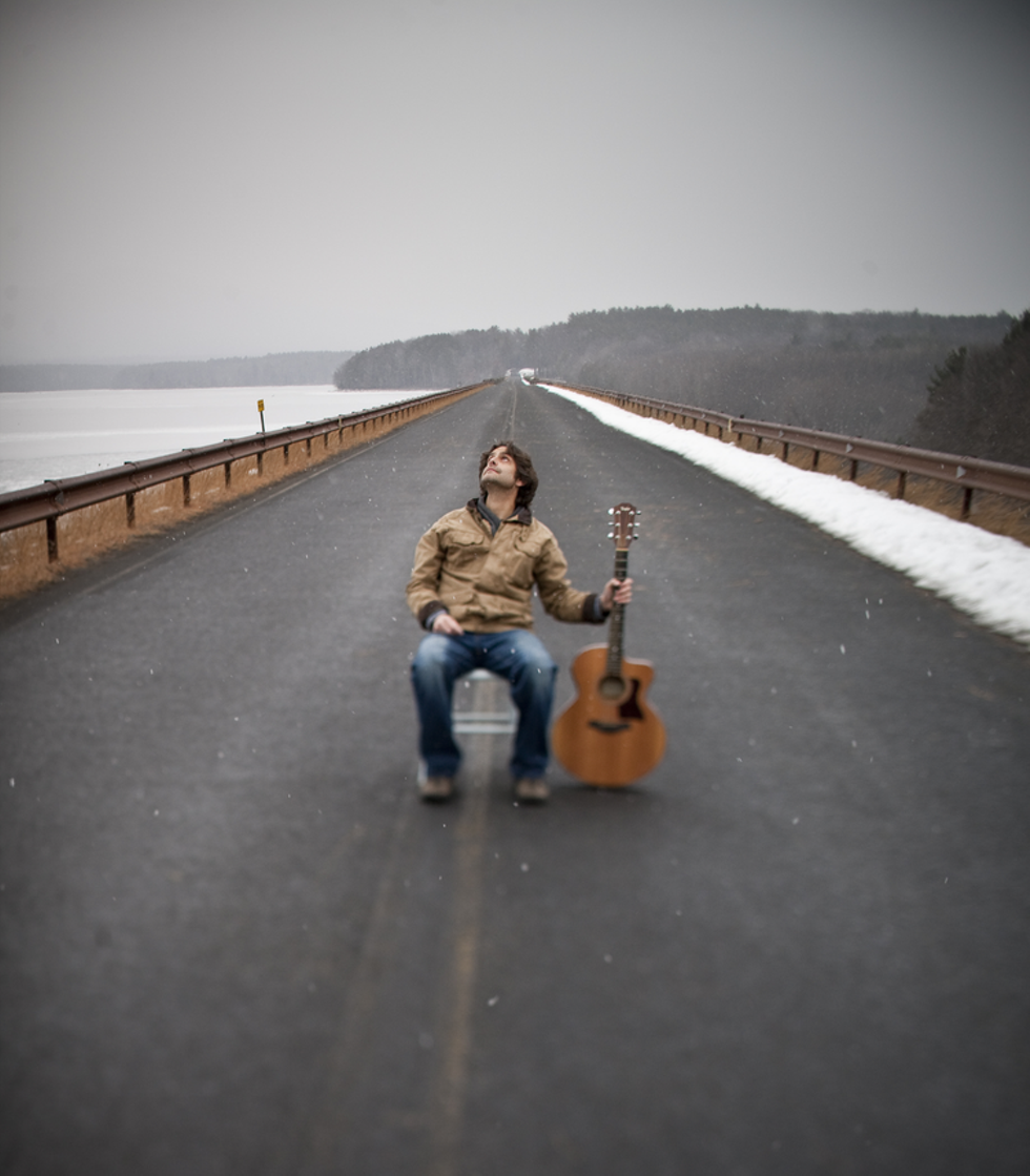 Mark Donato performs at the Poetry Barn