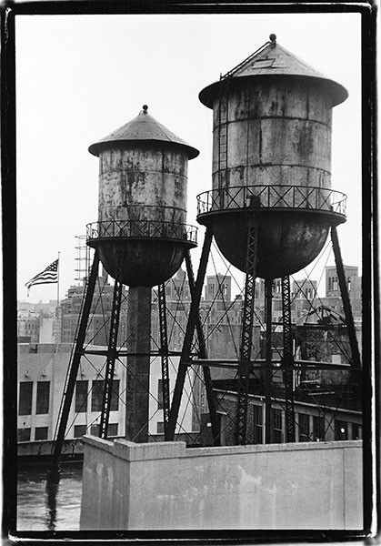 Metal water towers with flag, West 27th Street and 10th Avenue, 2006.