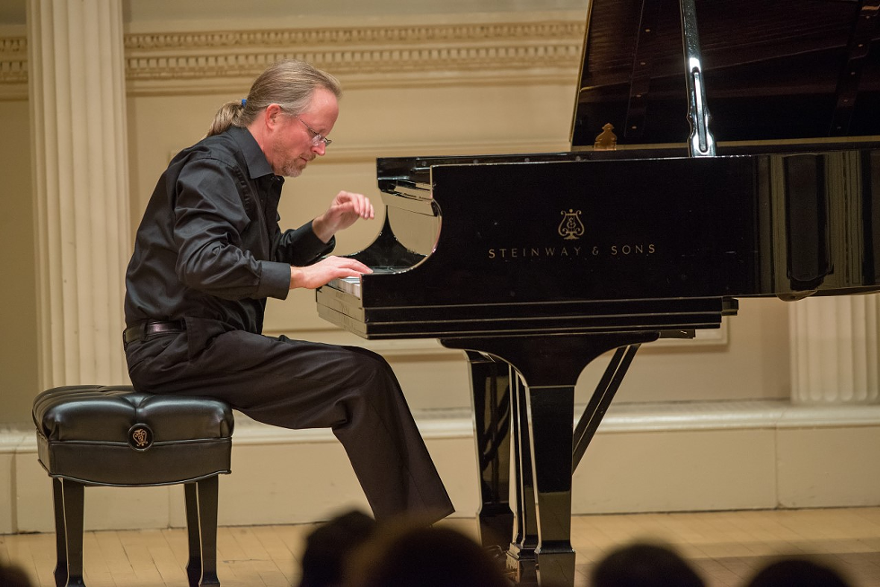 Composer and pianist Geoffrey Gee performing at Carnegie Hall.