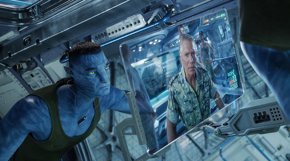 At one point in the new film, actor Stephen Lang's human Col. Quaritch, in a message from the grave, addresses his own hybrid Na'vi reincarnation.