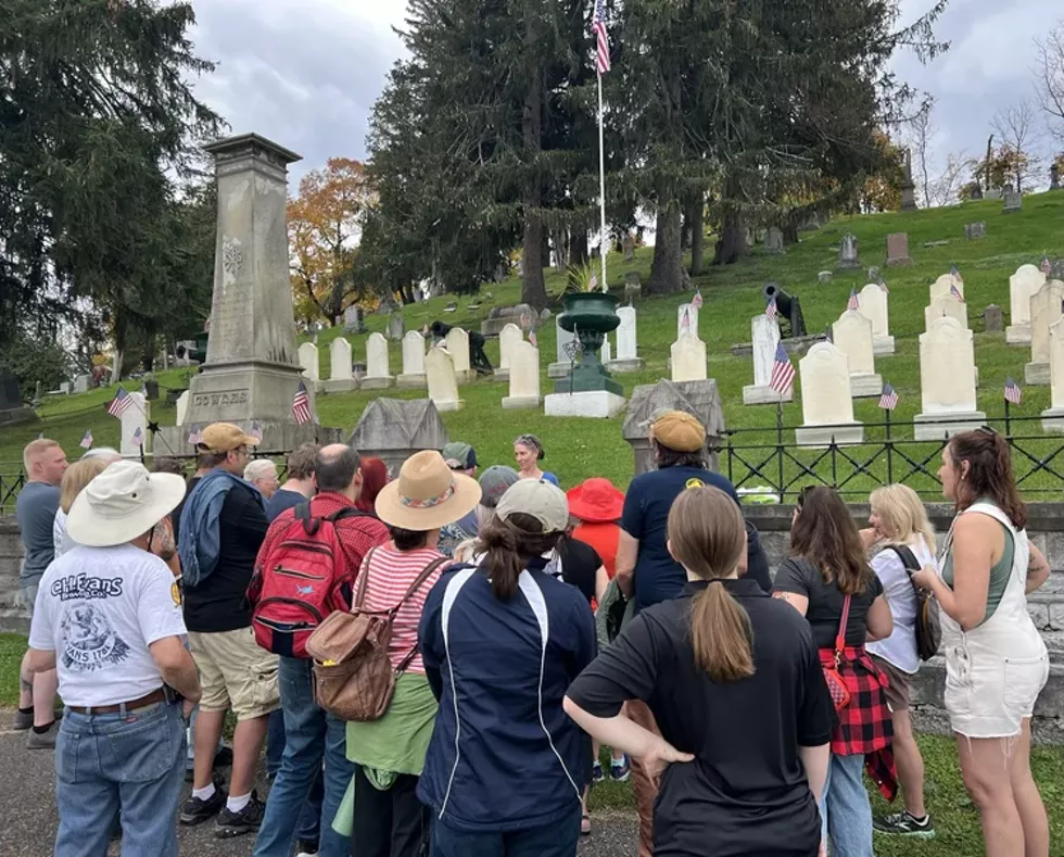 Kelley Drahushuk speaks to a group at the Civil War veterans&rsquo; gravesite.