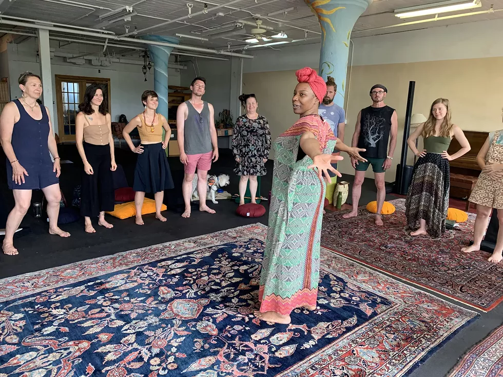 Facilitator Onome leading a class