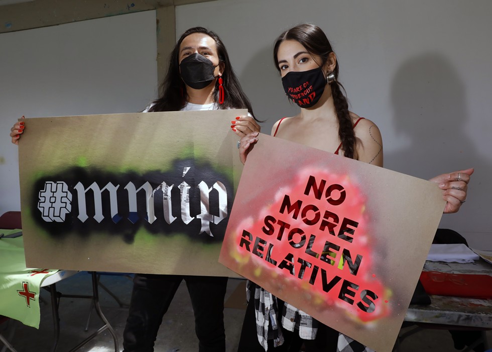 Artists Demian Din&eacute;Yazhi' (Din&eacute;) and Korina Emmerich (Puyallup) at a poster-making event at Art Omi on May 1.