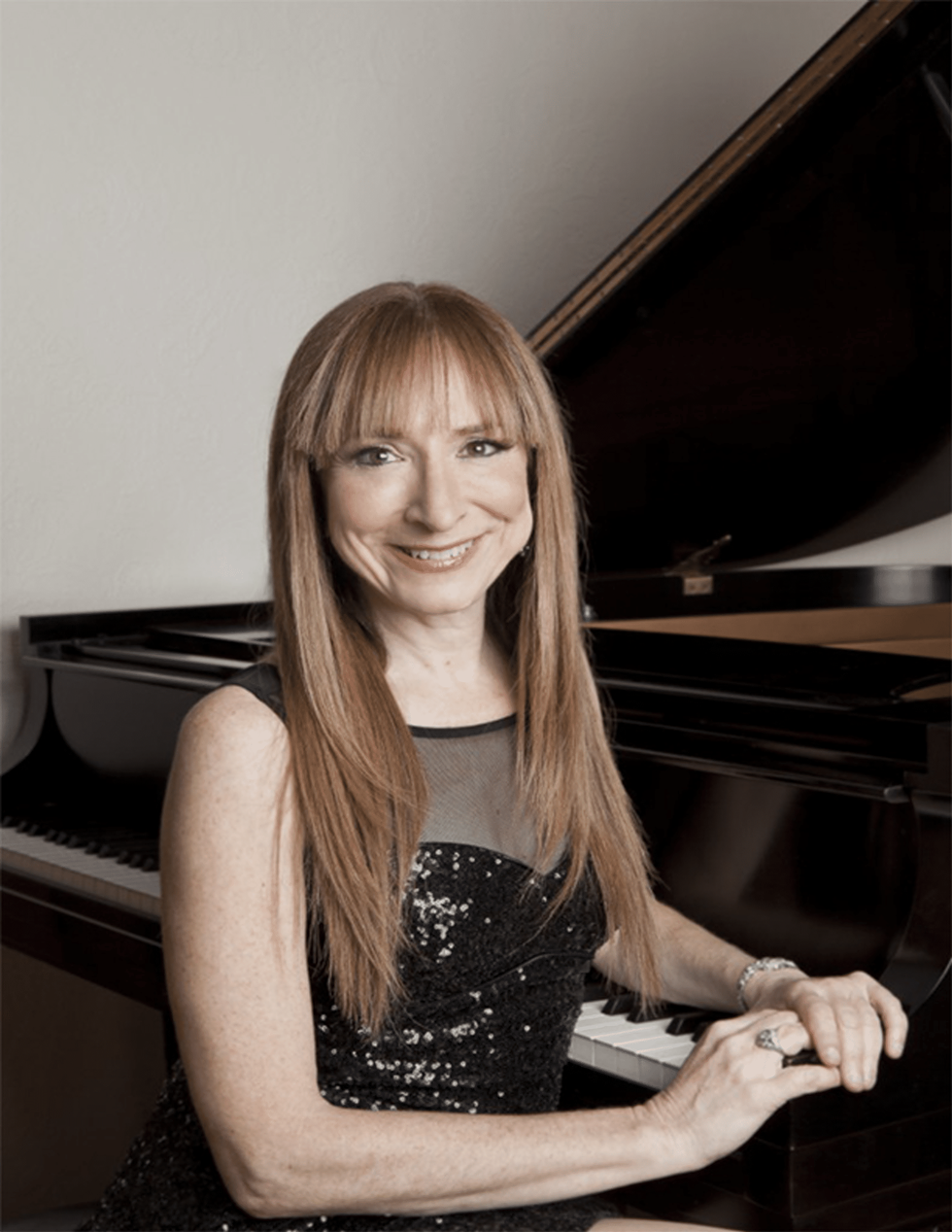 judith-lynn-stillman-at-piano.png