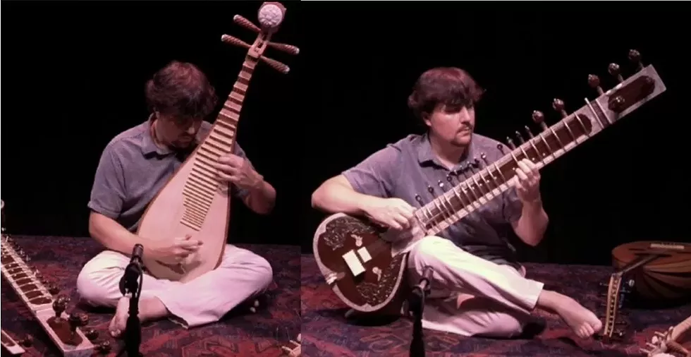 Chris Stephens playing Chinese Pipa and Indian Sitar